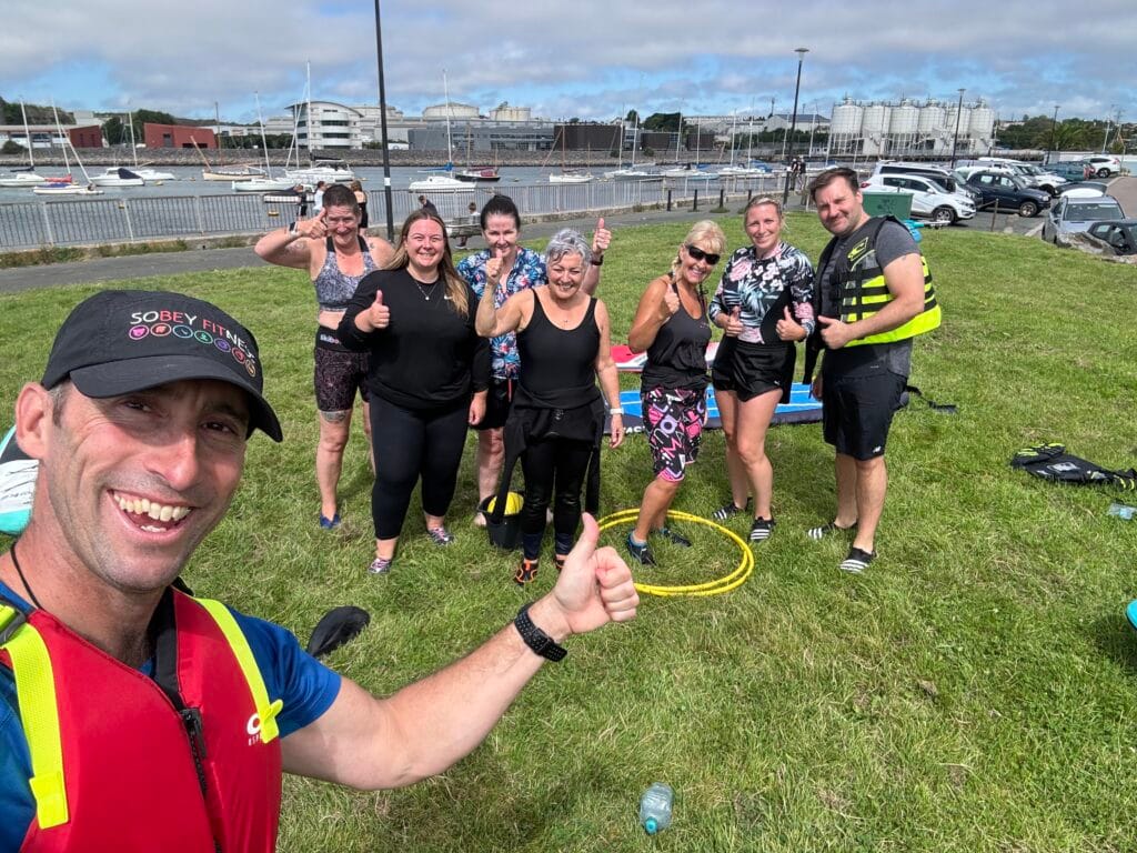 Group Paddleboarding Lesson - Sobey Fitness